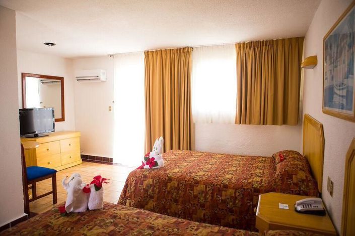 Hotel Qualton Club Ixtapa. Fotos, Videos, Comentarios, Paquetes, Ofertas,  Promociones