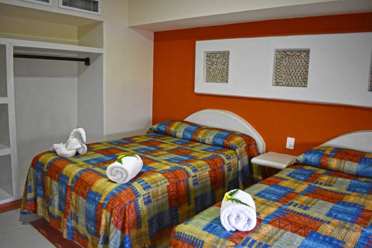 Aca Suites Ixtapa. Rentas Vacacionales en Ixtapa Zihuatanejo. Departamentos vacacionales en Ixtapa Zihuatanejo. Casas vacacionales en Ixtapa Zihuatanejo. Villas vacacionales en Ixtapa Zihuatanejo. Condominios vacacionales en Ixtapa Zihuatanejo. Renta de casas, departamentos, villas y condominios vacacionales en Ixtapa Zihuatanejo. Departamentos con vista al mar y alberca en Ixtapa Zihuatanejo